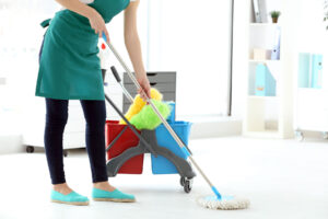 a cleaner from Wanny Cleaning LLC mopping a client's floor